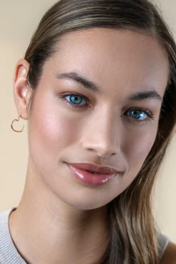 Zinzi 18mm gold plated zilveren halve oorringen in hartvorm 1,4mm buisdikte met vlindersluiting ZIO2584G