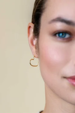 Zinzi 18mm gold plated zilveren halve oorringen in hartvorm 1,4mm buisdikte met vlindersluiting ZIO2584G