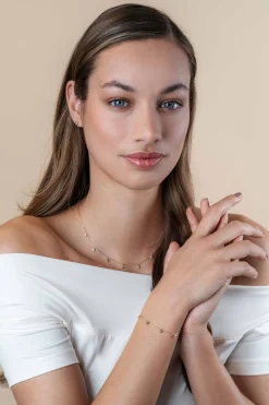 Discount Zinzi Gold 14 krt gouden armband met zeven ronde hangertjes, bezet met witte zirconia's 15,5-18,5cm ZGA451