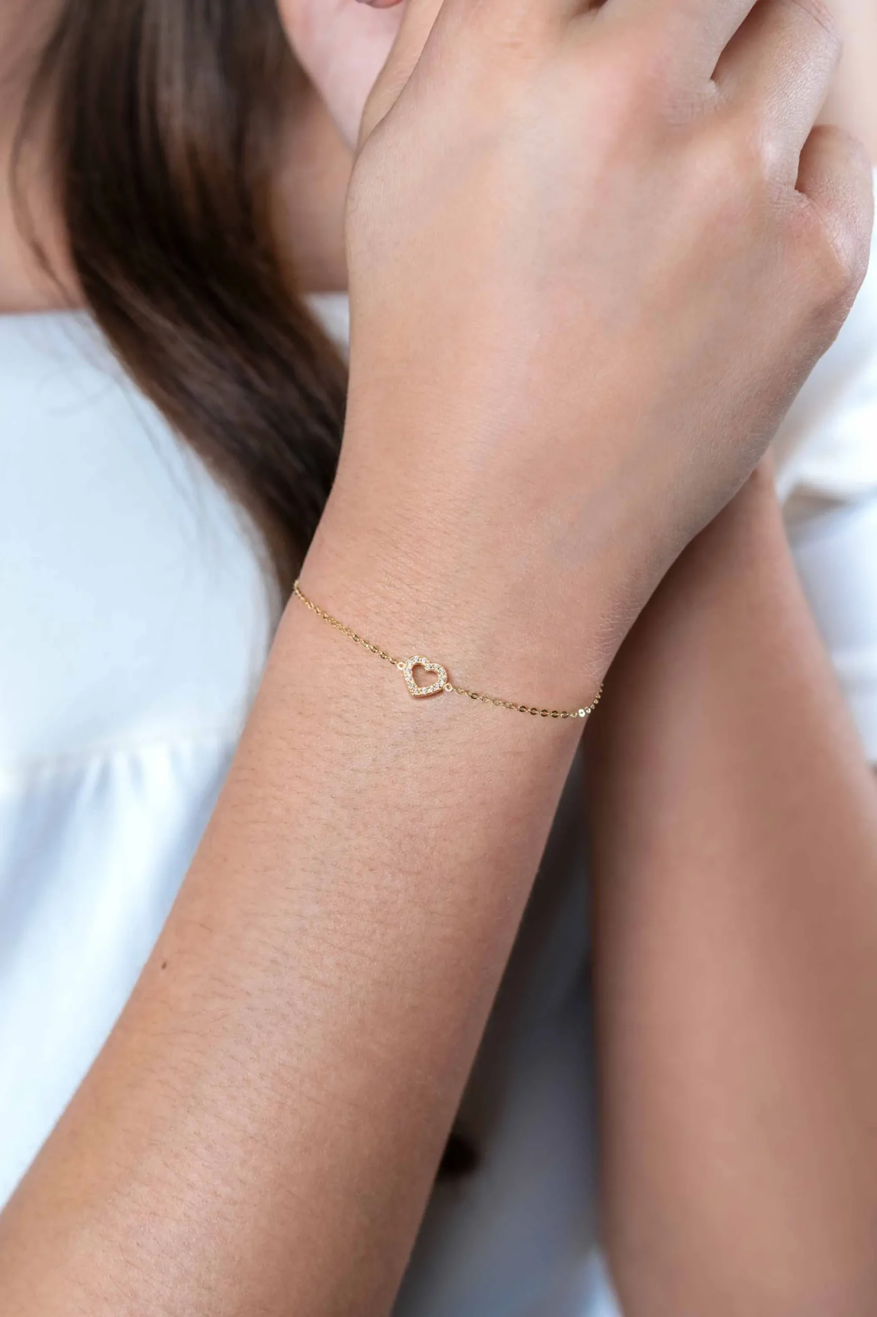 Best Zinzi Gold 14 krt gouden armband met sierlijk open hartje (7mm), bezet met witte zirconia's 16,5-19,5cm ZGA450