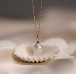 Outlet Zinzi Gold 14 krt gouden hanger met witte parel 10mm in natuurlijke vorm ZGH405 (zonder collier)