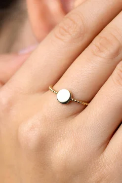 Best Zinzi Gold 14 krt gouden ring met bolletjes scheen en glanzend rond plaatje van 6,5mm ZGR399