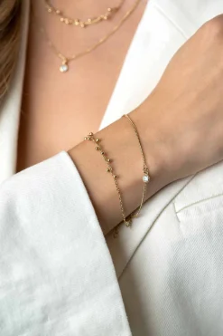 Online Zinzi gold plated zilveren multilook armband met ronde zetting witte zirconia en bolletjes 16,5-19cm ZIA2520Y