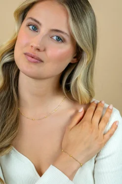 Best Zinzi gold plated zilveren fantasie armband met 5 geelgroene donuts en glanzende bolletjes 17-19,5cm ZIA2508