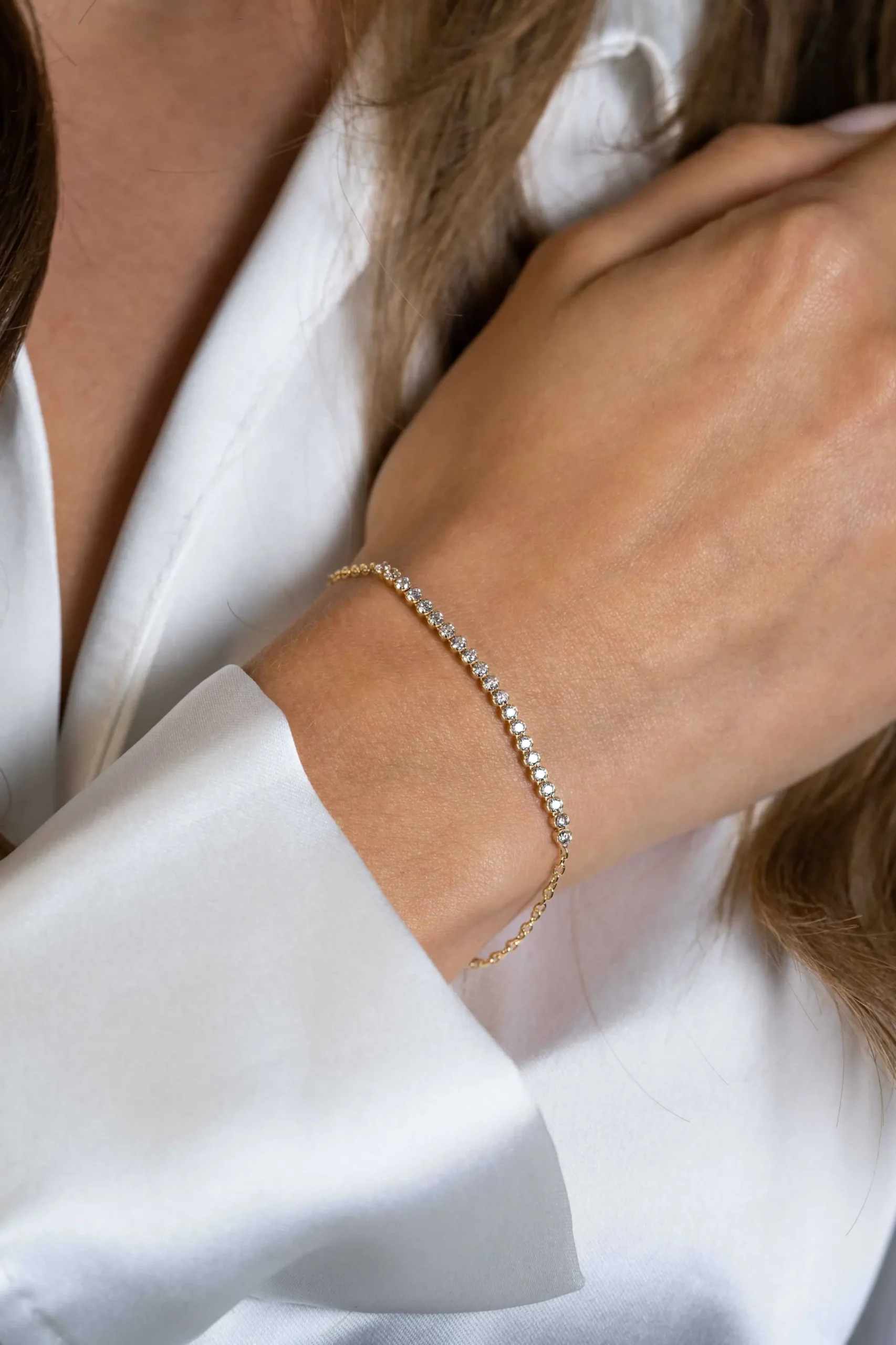 Clearance Zinzi gold plated zilveren armband, in het midden bezet met 21 witte zirconia's 16-19cm ZIA2370Y