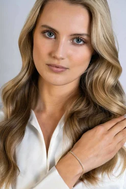 Clearance Zinzi gold plated zilveren armband, in het midden bezet met 21 witte zirconia's 16-19cm ZIA2370Y