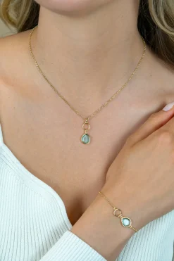Discount Zinzi gold plated zilveren ketting met open rondje en ovale hanger, bezet met turquoise kleursteen 40-45cm ZIC2716G