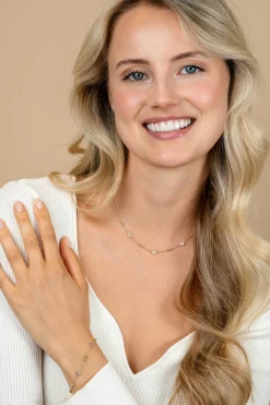 Best Zinzi gold plated zilveren schakelketting met trio-bolletjes en drie hartvormige witte zirkonia's 40-45cm ZIC2679