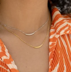 Sale Zinzi gold plated zilveren schakelkettinkje met grote veer. De veer staat symbool voor je vleugels uitslaan en vrijheid. 40-45cm ZIC2644G