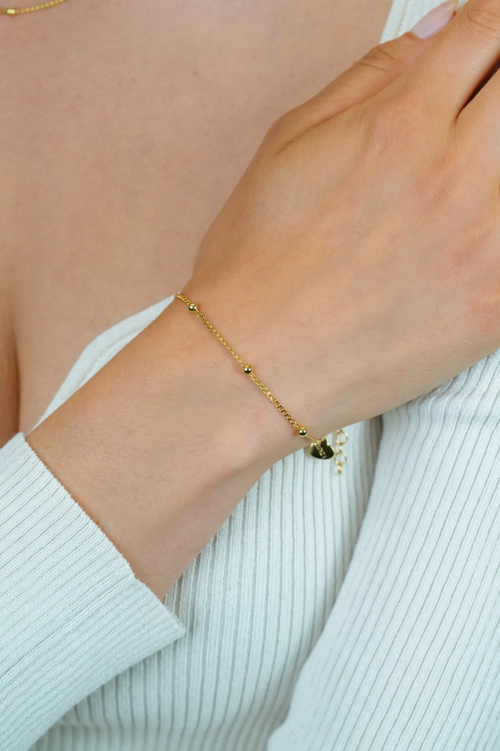 Best Zinzi gold plated zilveren gourmet schakelarmband met vijf glanzende bolletjes (3mm breed) ZIA2714G