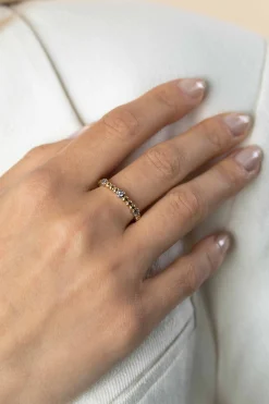 Clearance Zinzi gold plated zilveren aanschuifring met bolletjes scheen en drie ronde zettingen bezet met witte zirconia ZIR2569