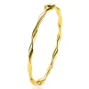 Online Zinzi gold plated zilveren bangle armband met gedraaide buis 4mm met luxe scharniersluiting ZIA2756G