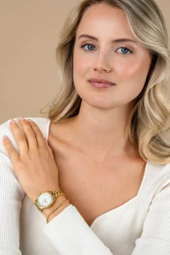 Sale Zinzi Tresor horloge 32mm bezet met witte zirkonia's, parelmoer wijzerplaat en goudkleurige stalen kast en schakelband ZIW2434
