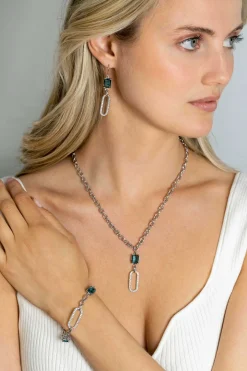 Online Zinzi zilveren fantasie schakel armband met ovale schakel, bezet met witte zirconia's en twee groenachtig blauwe (petrol) kleurstenen in vierpootszetting 18-21cm ZIA2487
