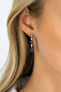 Outlet Zinzi zilveren lange oorsieraden 29mm met een prachtige combinatie van blauwe kleurstenen. In vierkant, ovaal en peervorm, afgewisseld met kleine witte zirconia's. ZIO2397