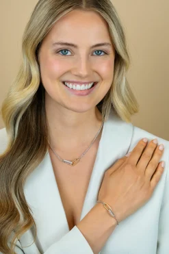 Hot Zinzi zilveren schakelketting met twee verbonden ovale schakels: één gold plated, de ander bezet met witte zirkonia's 42-45cm ZIC2758